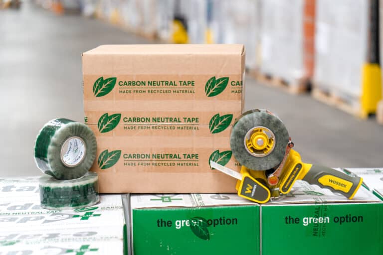 Carbon Neutral Packing Tape on a cardboard box and tape dispenser. From Wessex Packaging.