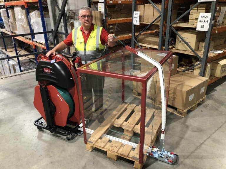 ErgoPack pallet strapping machine being used to strap a pallet. Wessex Packaging is the official GB ErgoPack distributor.